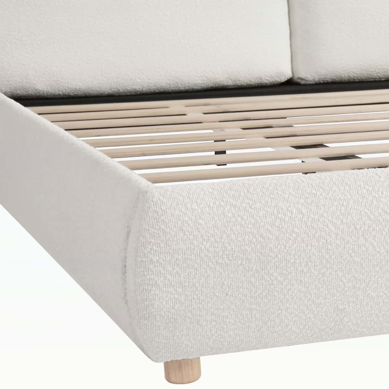 Luxurious Upholstered Platform Bed with Versatile Pillows and Graceful Headboard