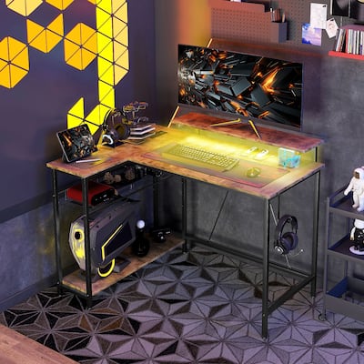 L Shaped Gaming Desk with LED Lights Power Outlets USB Ports Monitor Stand and Storage Shelves Reversible Rustic Brown