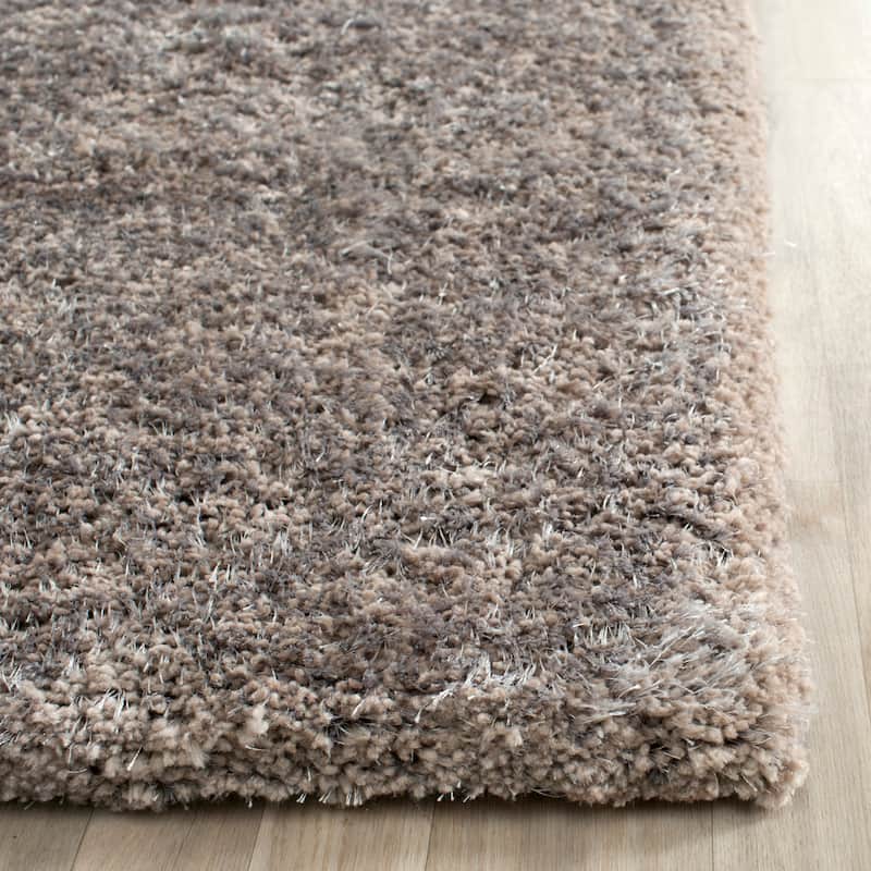 SAFAVIEH Handmade South Beach Leonella Shag Solid Polyester Rug