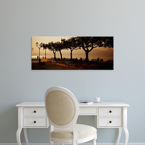 Easy Art Prints Panoramic Images's 'Benches in a park, Torri Del Benaco, Lake Garda, Italy' Premium Canvas Art