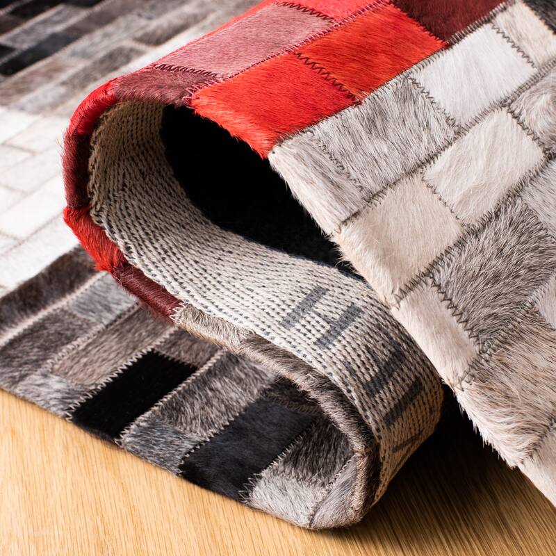 SAFAVIEH Handmade Studio Leather Nakisha Modern Leather Rug
