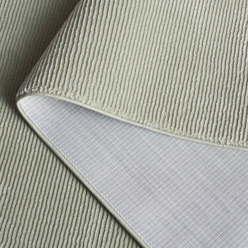 SAFAVIEH Revive Avie Solid Rug