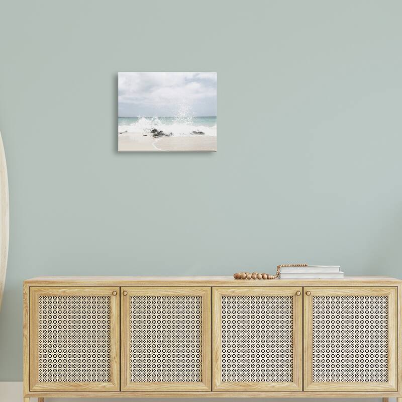 Stupell Tropical Sea Coast Wave Splash Rocky Sand Beach Canvas Wall Art - Blue