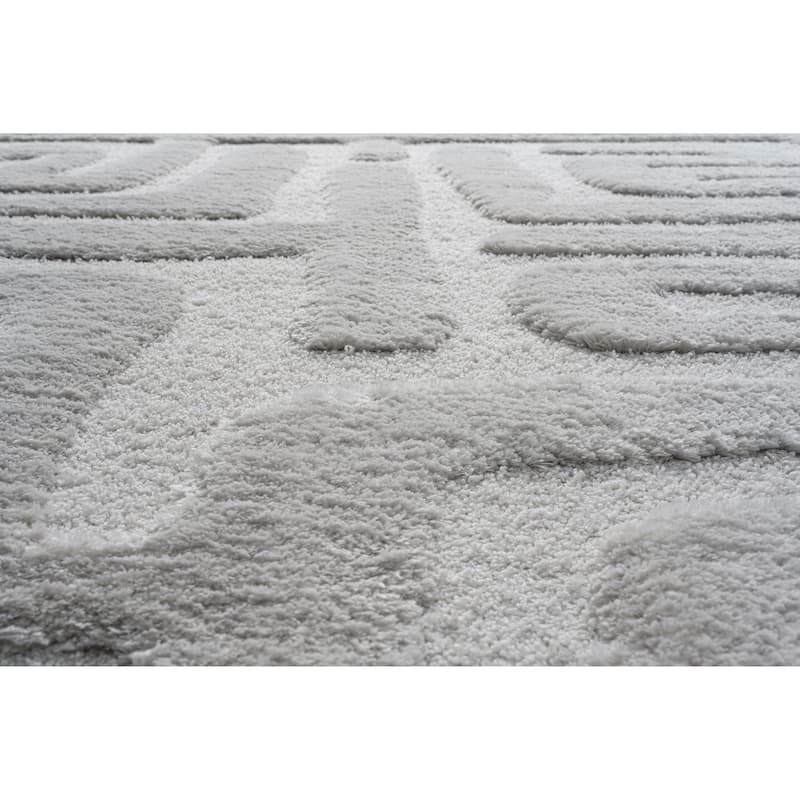 Lillian Ivory and White Recycled Polyester Area Rug - 9' x 12'