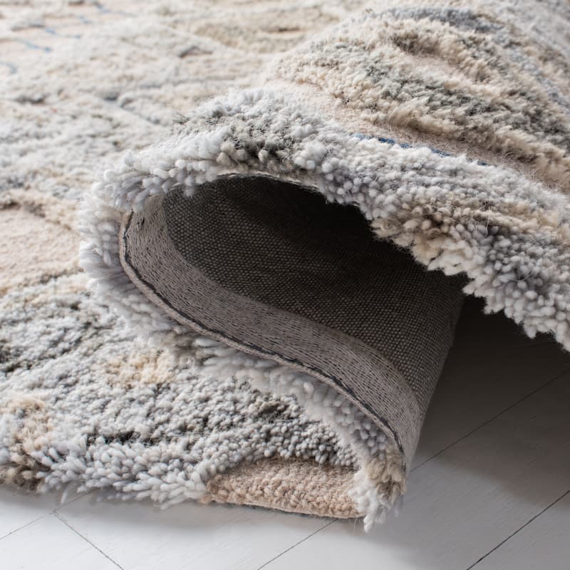 SAFAVIEH Handmade Casablanca Shag Grainne Tribal Wool Rug