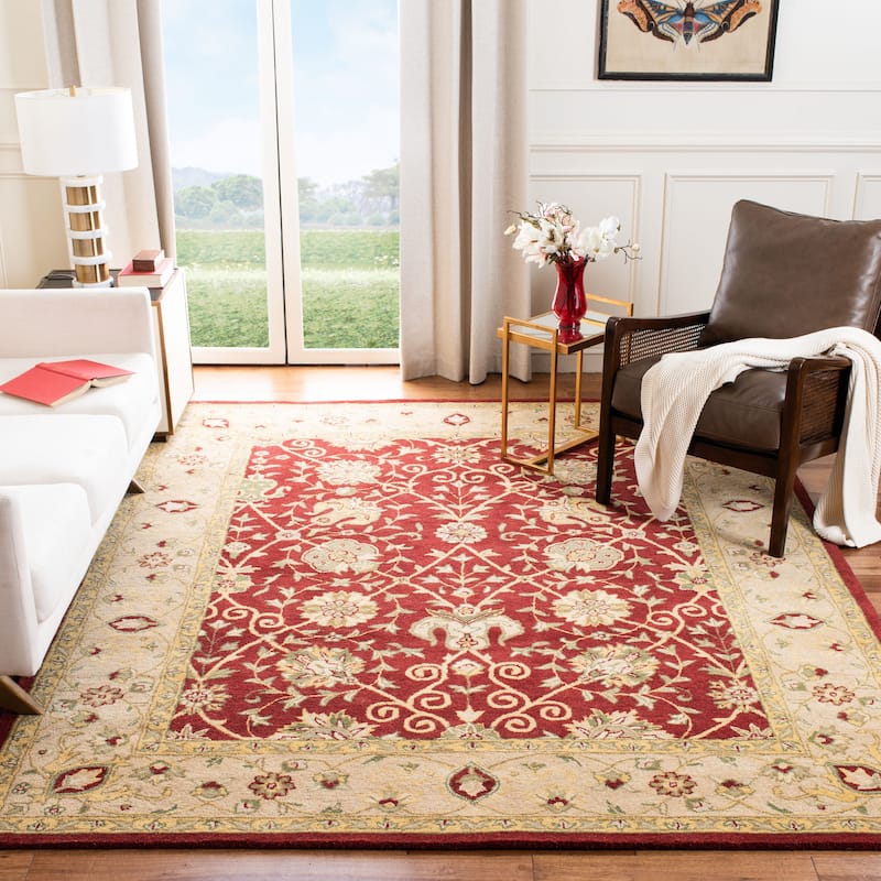 SAFAVIEH Handmade Antiquity Mazie Traditional Oriental Wool Rug - 9'6" x 13'6" - Rust