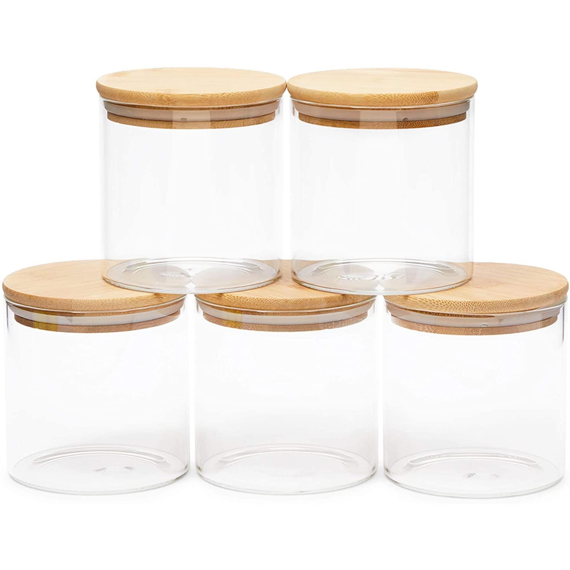 https://ak1.ostkcdn.com/images/products/is/images/direct/9bae9cfa055323f474c06600b0c01ca10c047d29/Glass-Canisters-with-Airtight-Bamboo-Lids-for-Pantry-Storage-%284-x-4.13-In%2C-5-Pack%29.jpg