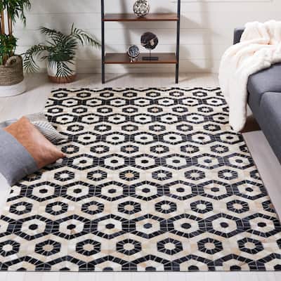 SAFAVIEH Handmade Studio Leather Alesha Mid-Century Modern Rug