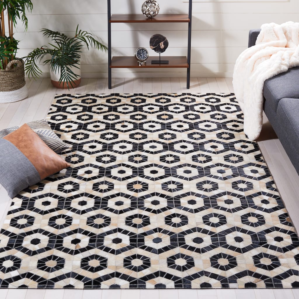 SAFAVIEH Handmade Studio Leather Alesha Mid-Century Modern Rug