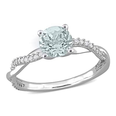 Miadora Aquamarine and 1/6ct TDW Diamond Crossover Birthstone Ring in 14k White Gold