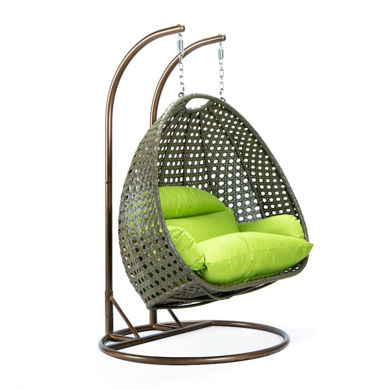 LeisureMod 2-Person Hanging Egg Swing Chair with Metal Stand - Handcrafted Beige Wicker, Patio Hammock Lounger with Cushions