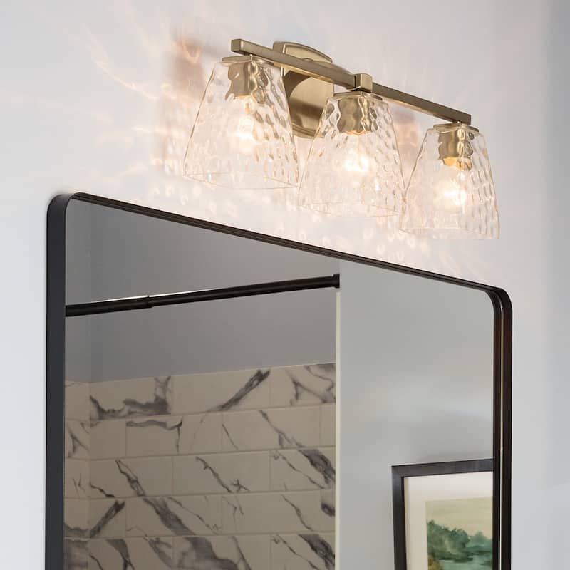 Kichler Lighting Marant 23.75" 3-Light Vanity Light with Clear Water Glass in Champagne Bronze