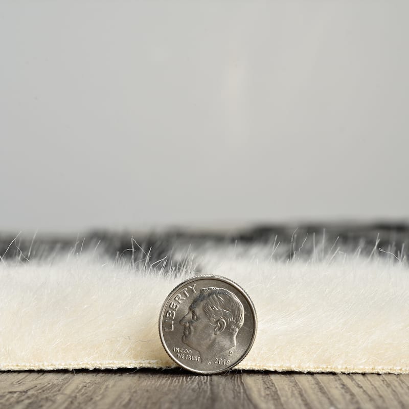 Faux Cowhide Area Rug - 5' x 6'6"