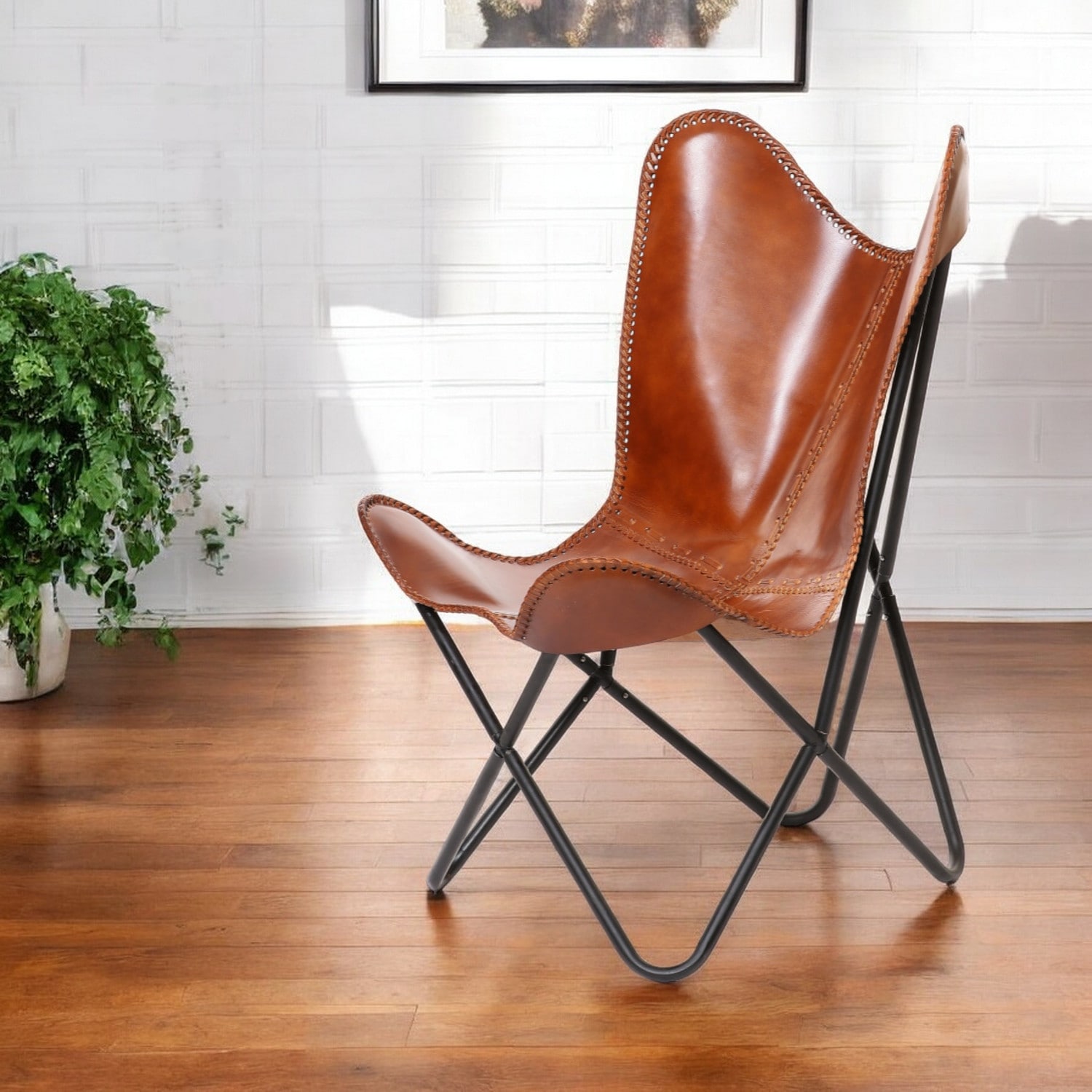 HomeRoots 32" Brown And Black Genuine Leather Butterfly Chair - 31.5' X '34.5' X '31.5