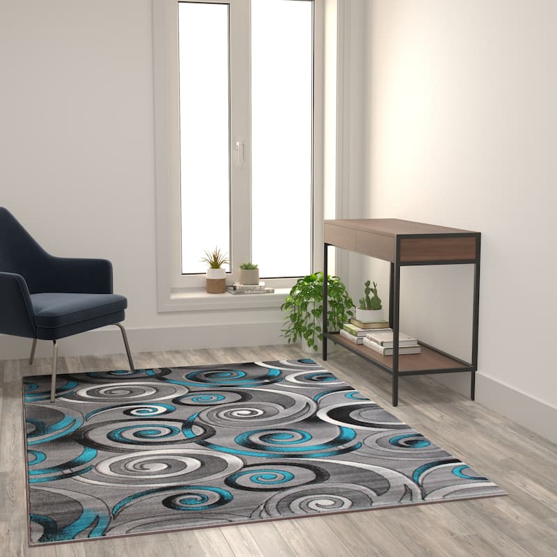 Modern Spiral Patterned Olefin Indoor Area Rug - 5' x 7' - Turquoise