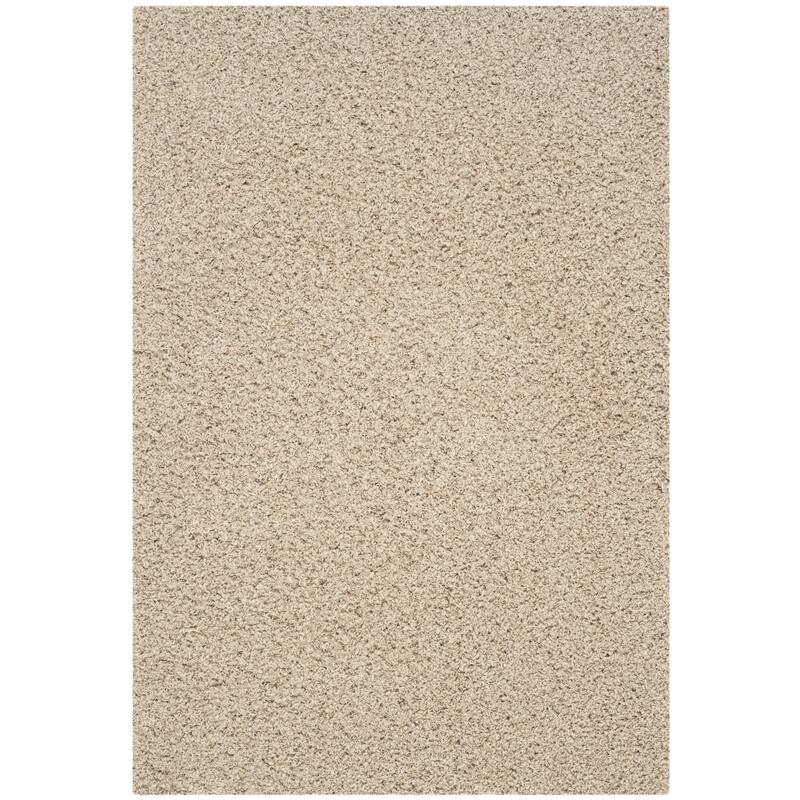 SAFAVIEH Handmade Sheep Shag Kalie Solid Polyester Rug - 4' x 6' - Beige