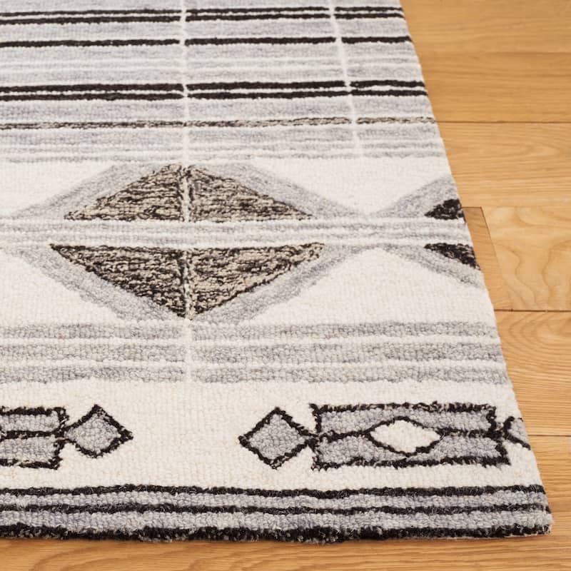 SAFAVIEH Handmade Ebony Houkje Modern Wool Rug