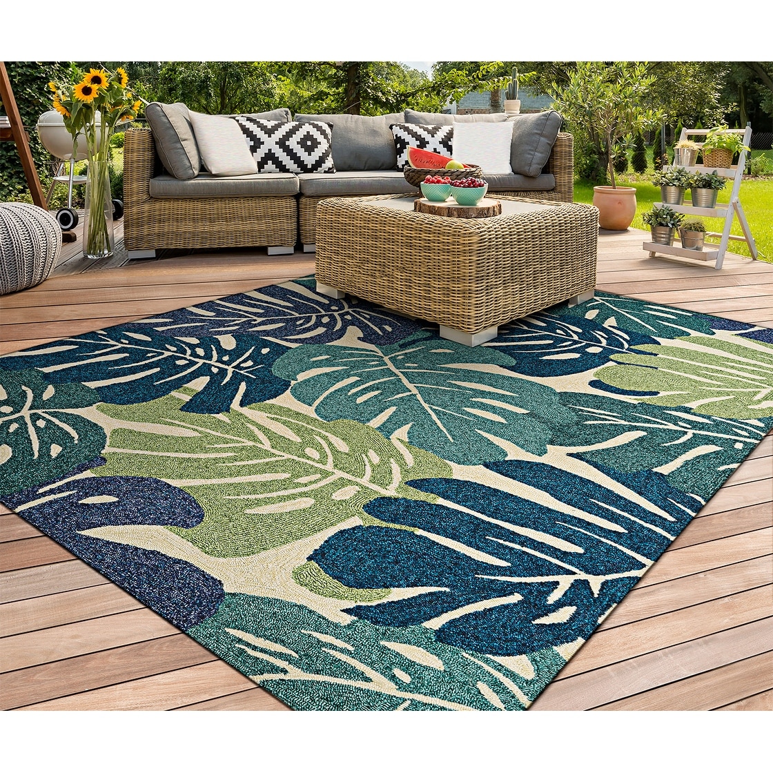 https://ak1.ostkcdn.com/images/products/is/images/direct/9c713de21d8ff02ea204510bbeb1545a6bb9eed2/Miami-Arum-Teal-Navy-Indoor--Outdoor-Area-Rug.jpg