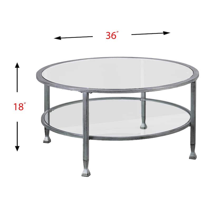 SEI Furniture Glenn Distressed Silver Round Coffee Table with Glass Top and Shelf