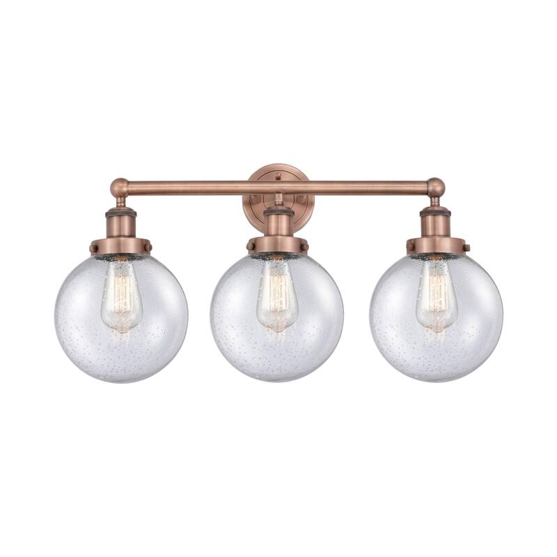 Innovations Lighting 616-3W-10-25 Beacon Vanity Beacon 3 Light 25" - Antique Copper / Seedy