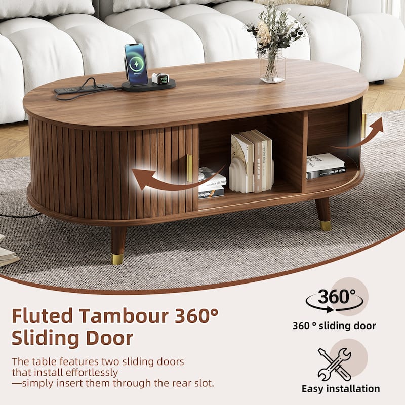 42.5" Mid-Century Oval Coffee Table – Solid Wood Fluted Design with Sliding Tambour Door & Built-In Charging Station.