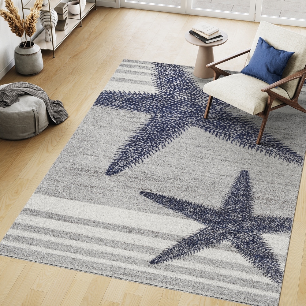 https://ak1.ostkcdn.com/images/products/is/images/direct/9cf822218ef5f8377eeffa45a5ceaf72a8d9fbce/Brooklyn-Rug-Co-Nidia-Nautical-Striped-Area-Rug.jpg