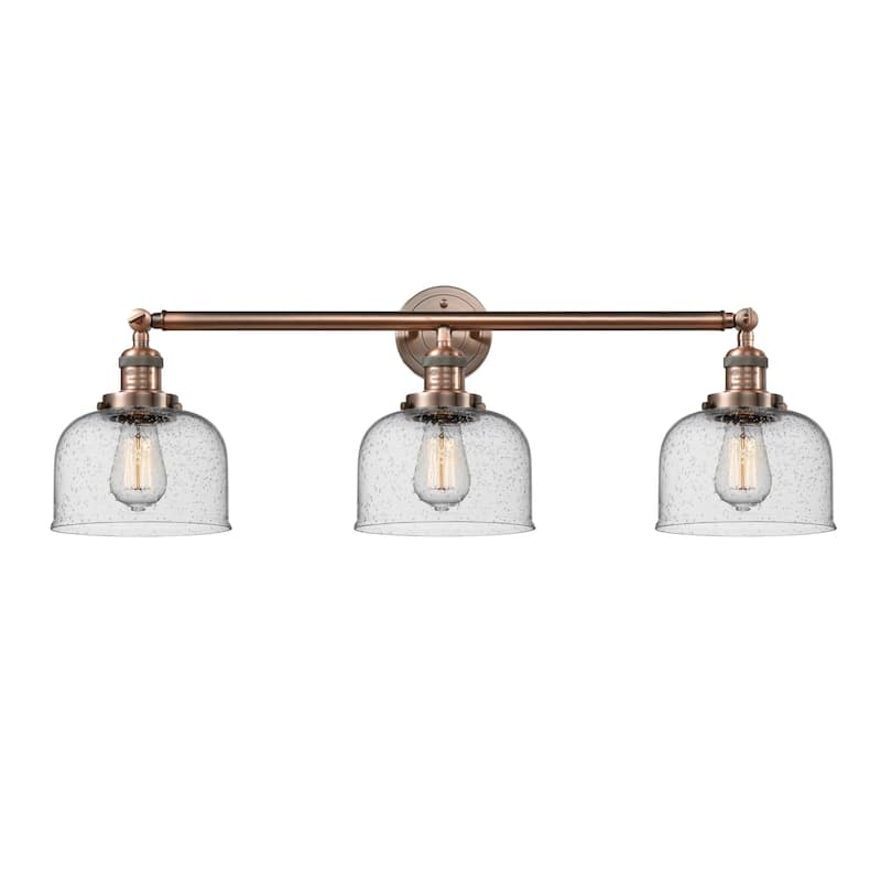 Innovations Lighting Large Bell 3 Light 32" Wide Bathroom Vanity Light - Antique Copper / Seedy