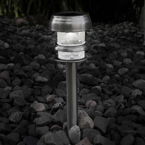 Solar stake spotlights top