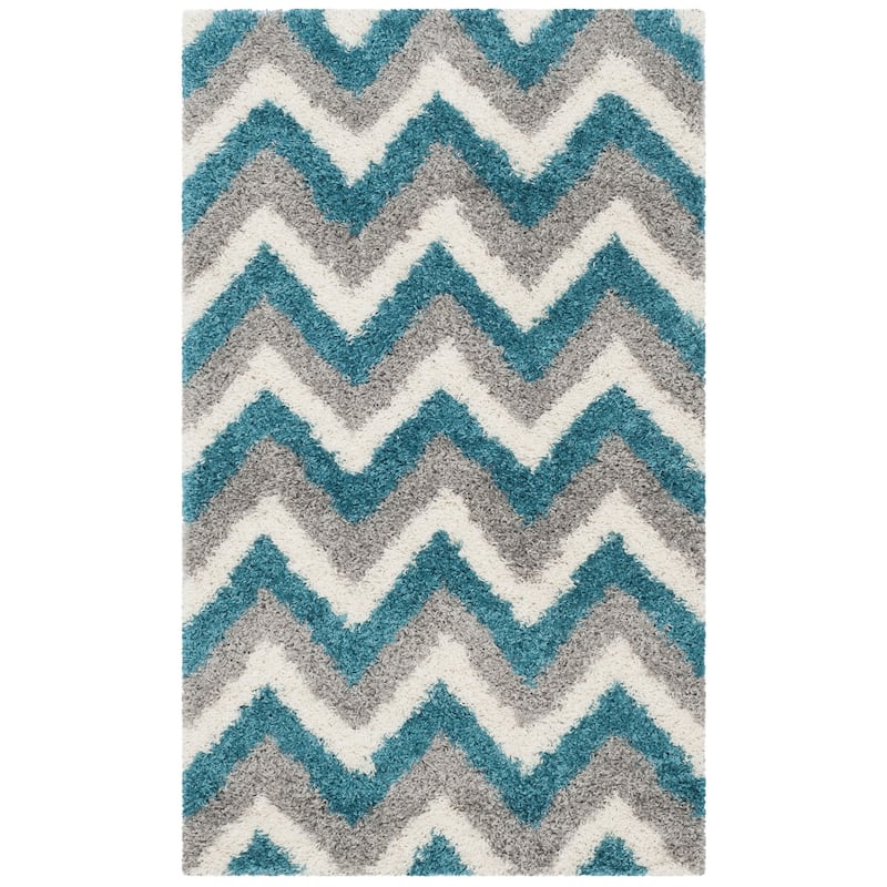 SAFAVIEH Kids Shag Nikki Nursery Playroom 2-inch Thick Rug - 2'3" x 5' - Ivory/Blue
