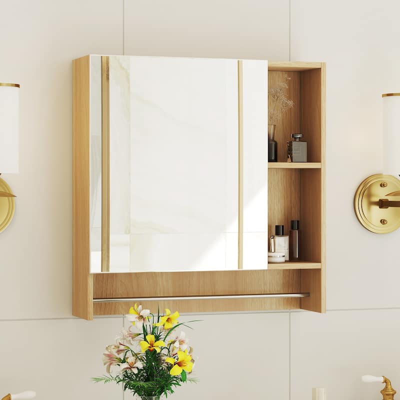 Wall-mounted bathroom medicine cabinet with shelves and a towel rack, designed for over-the-toilet storage and organization.