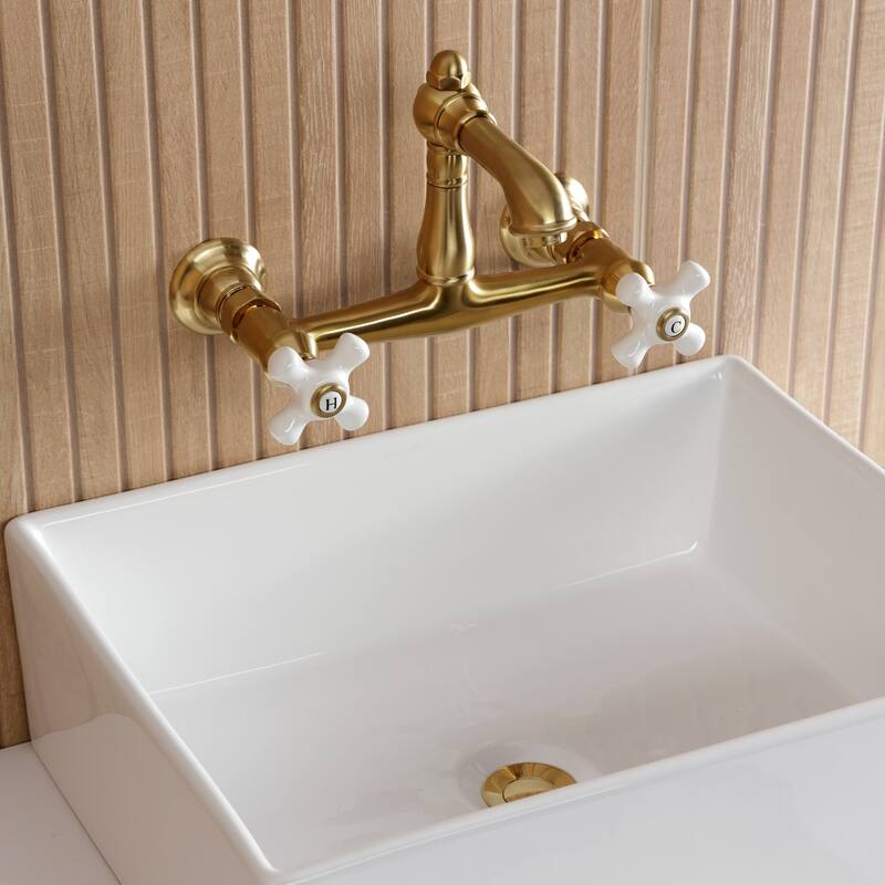 Kingston Brass English Country Two-Handle 2-Hole Wall Mount Bathroom Faucet