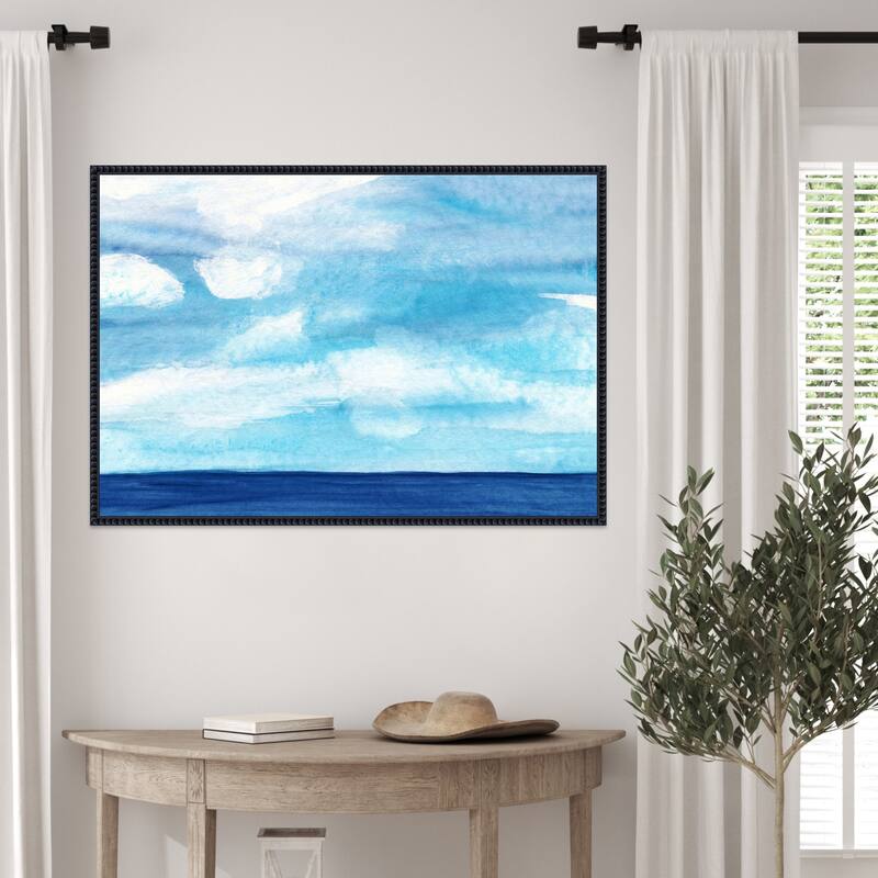 Tranquil Blue Ocean with Cloudy Skies by Danushka Abeygoda Framed Canvas Wall Art Print