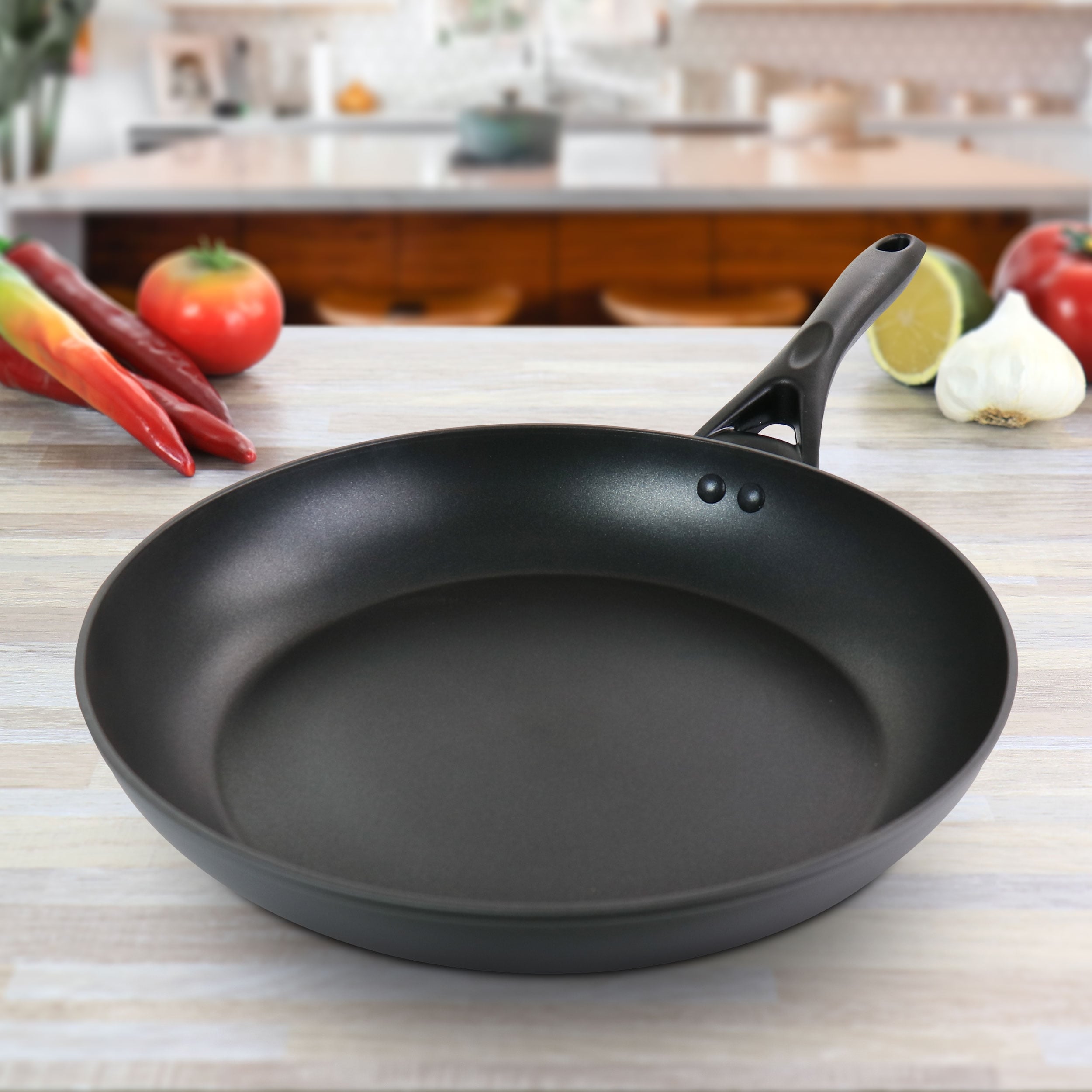 https://ak1.ostkcdn.com/images/products/is/images/direct/9d7c9940eb86cb1a396490fcf9c52b07bcc7d87e/Oster-12-Inch-Aluminum-Frying-Pan.jpg