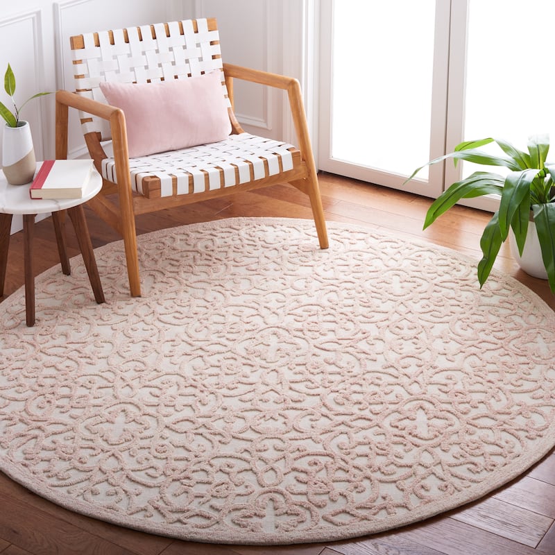 SAFAVIEH Handmade Trace Megane Modern Wool Rug - 6' Round - Ivory/Pink