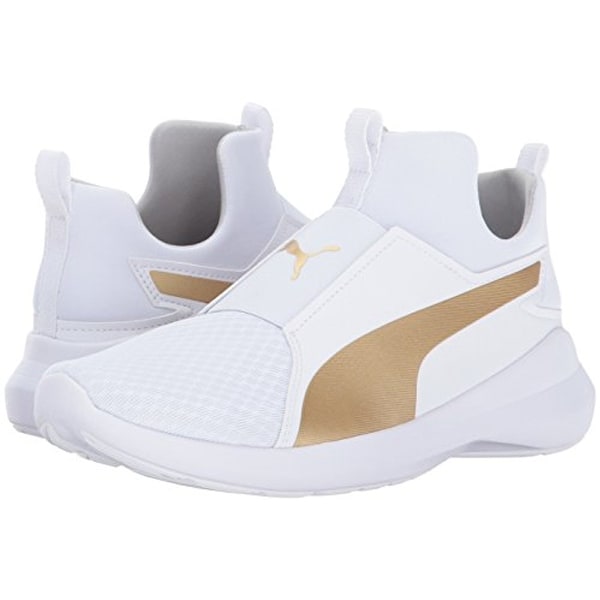 white and gold pumas with strap