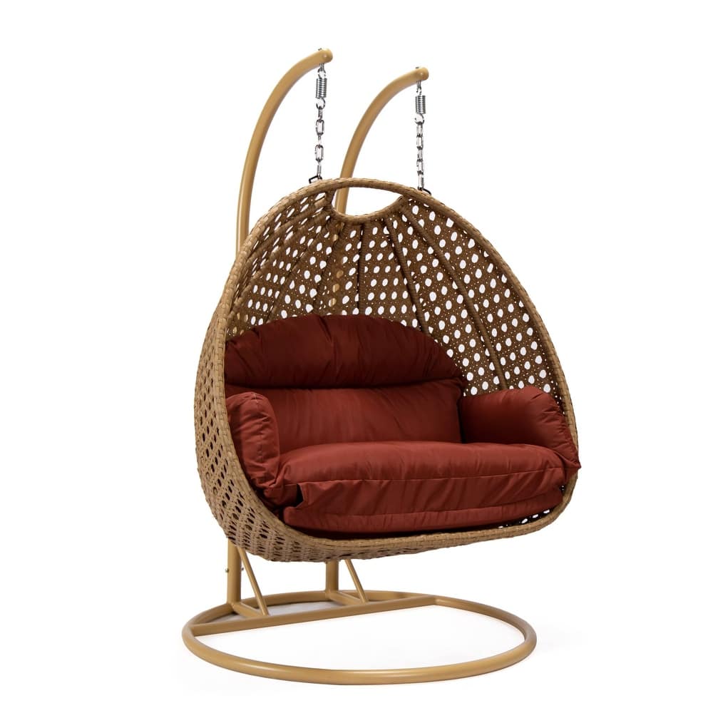 LeisureMod Mendoza 2-Person Hanging Egg Swing Chair - Handcrafted Light Brown Wicker, Patio Hammock Lounger with Cushions - 53"