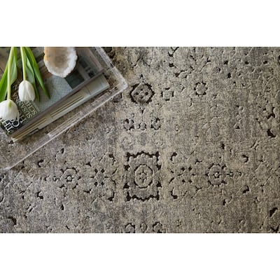 Alexander Home Carissa Distressed Floral Border Area Rug