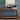 Petter Solid Wood Console Table with Shelf by East at Main