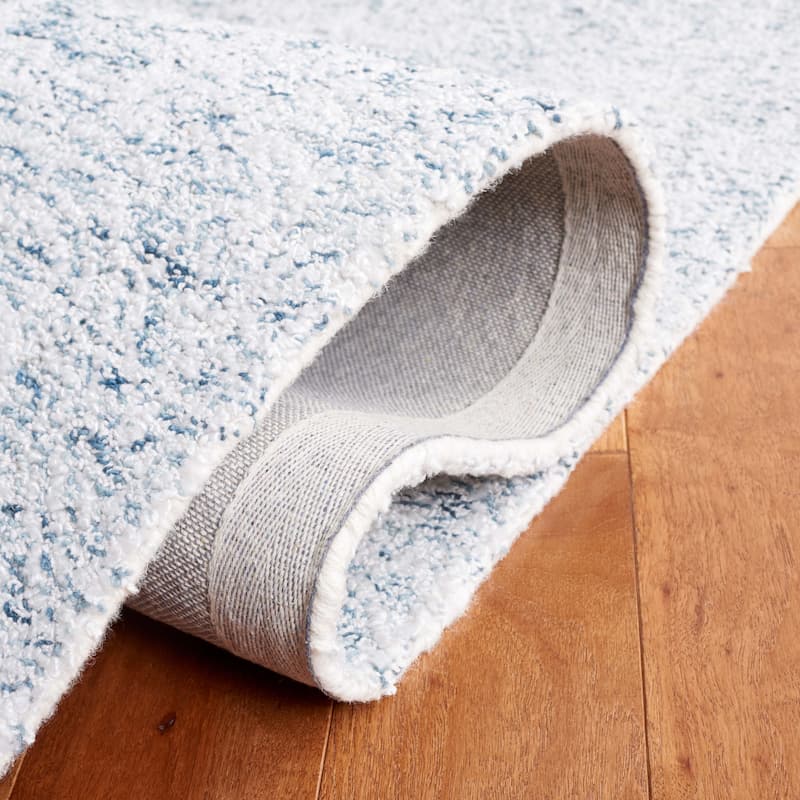 SAFAVIEH Handmade Ebony Eletta Modern Rug