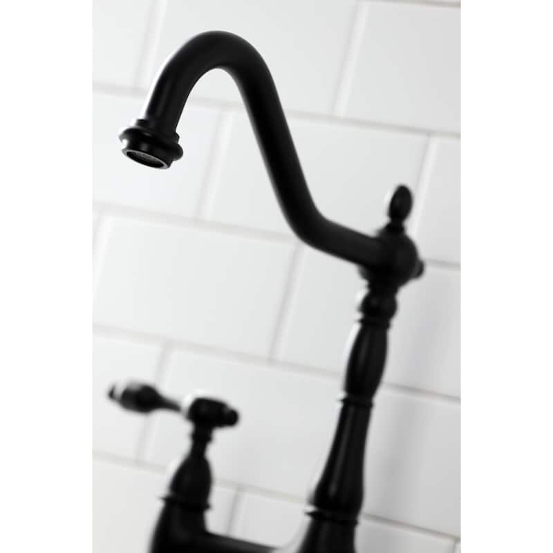 Kingston Brass Tudor Bridge Kitchen Faucet with Brass Sprayer