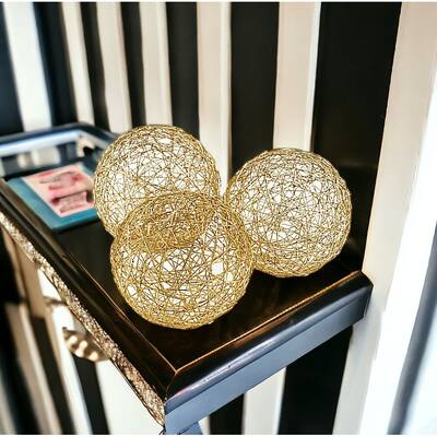 HomeRoots Set of Three Gold Aluminum Decorative Orbs - 4' X '4' X '4