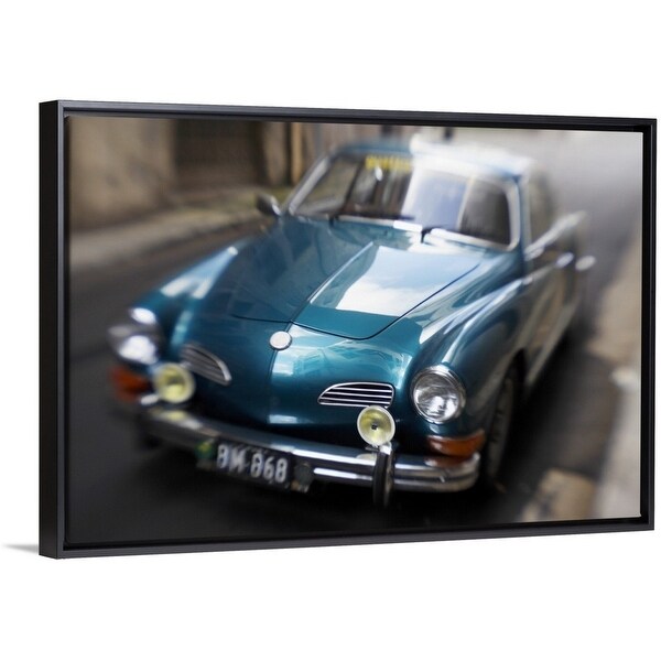 Shop Blurred Motion Shot Of A Metallic Blue Classic Car