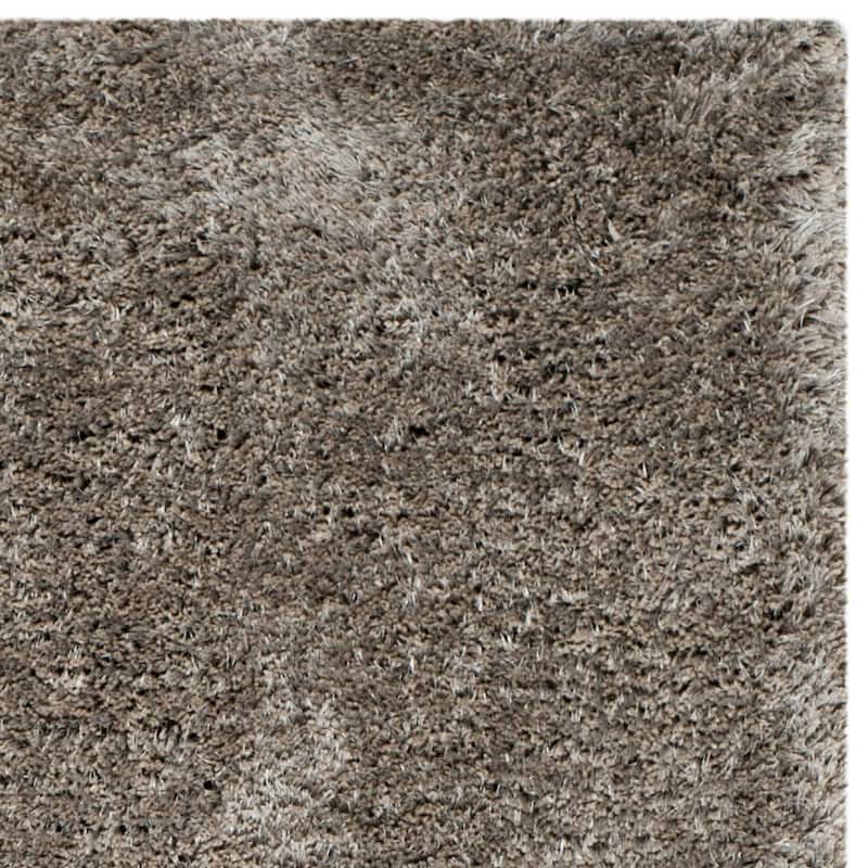 SAFAVIEH Handmade South Beach Leonella Shag Solid Polyester Rug