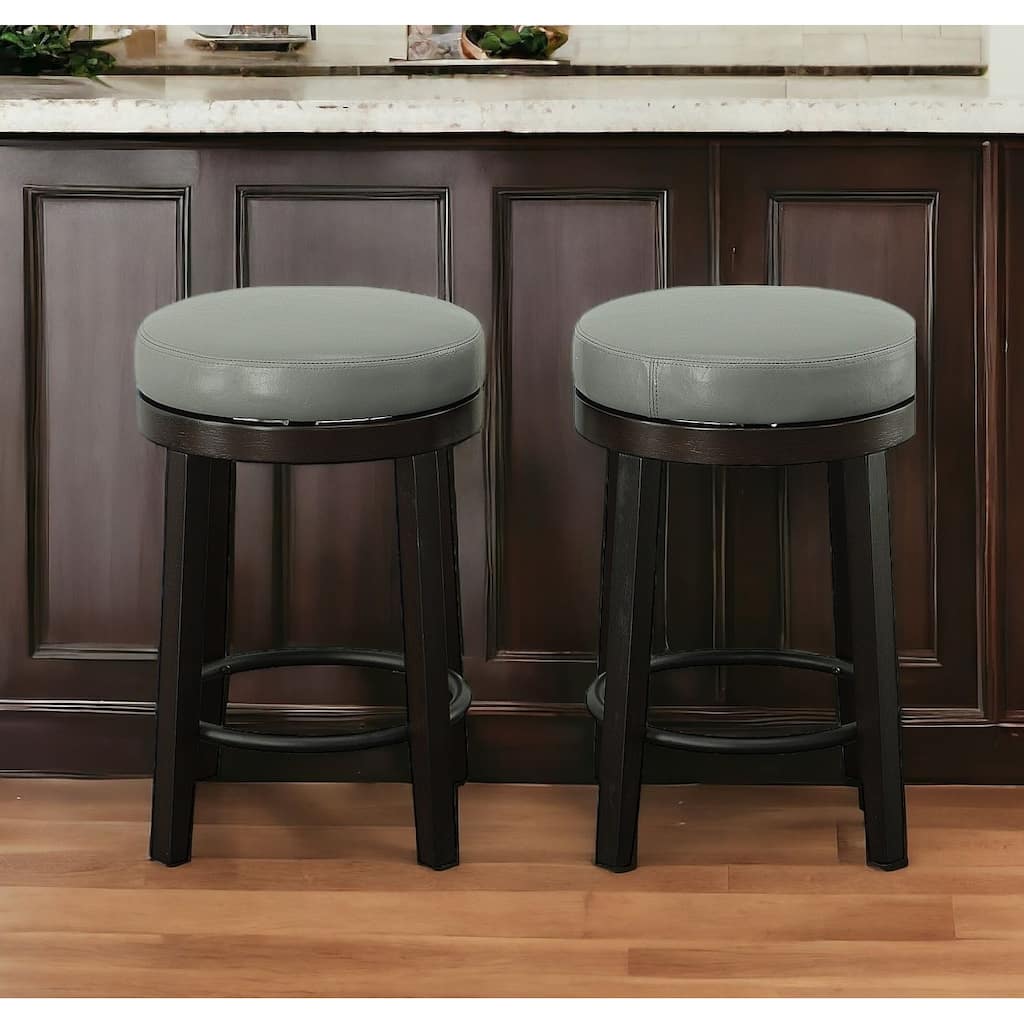 HomeRoots Set of Two 24" Gray And Espresso Faux Leather And Solid Wood Swivel Backless Counter Height Bar Chairs