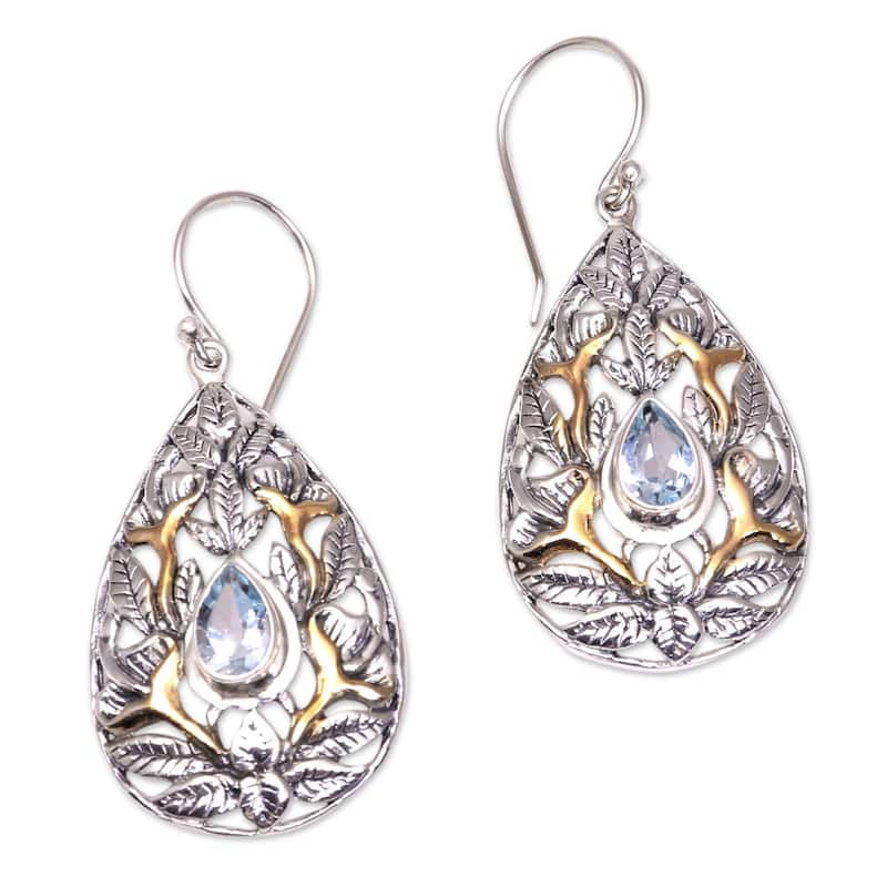 NOVICA Hidden Jungle, Gold accented blue topaz dangle earrings - 1.8*0.8