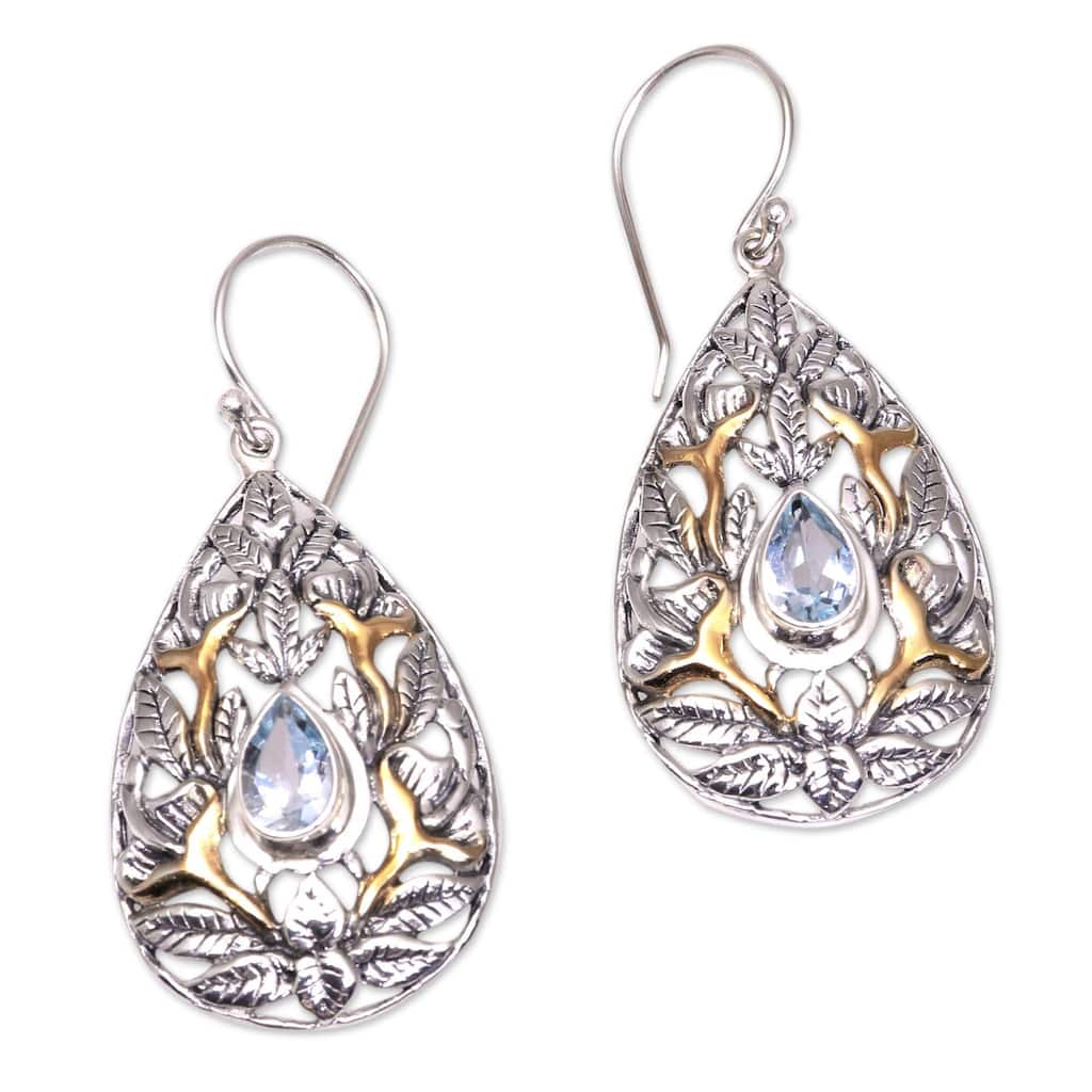 NOVICA Hidden Jungle, Gold accented blue topaz dangle earrings - 1.8*0.8