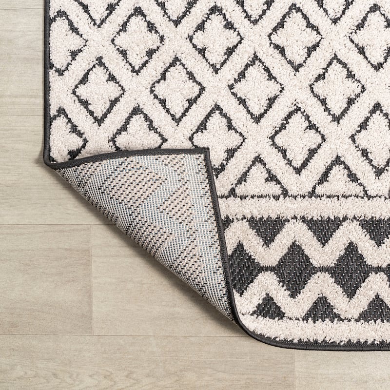 JONATHAN Y Duenas High-Low Two-Tone Monstera Leaf Area Rug