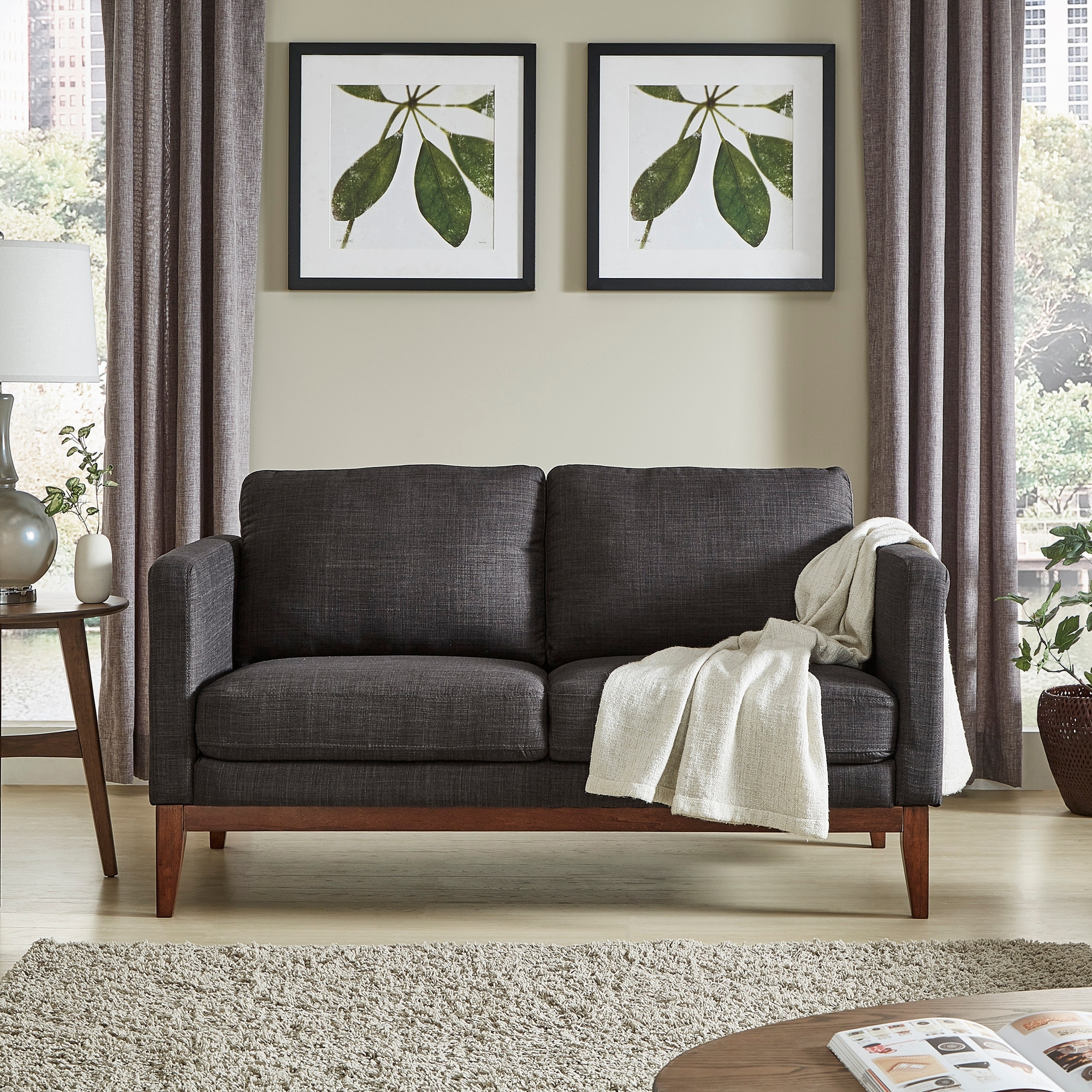 https://ak1.ostkcdn.com/images/products/is/images/direct/9f9890644d61374a82801775704988dac7bbb768/Carson-Carrington-Mid-Century-Linen-Sofa-or-Loveseat.jpg