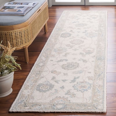 SAFAVIEH Hand-Tufted Ebony Zhanat Modern & Contemporary Wool Rug
