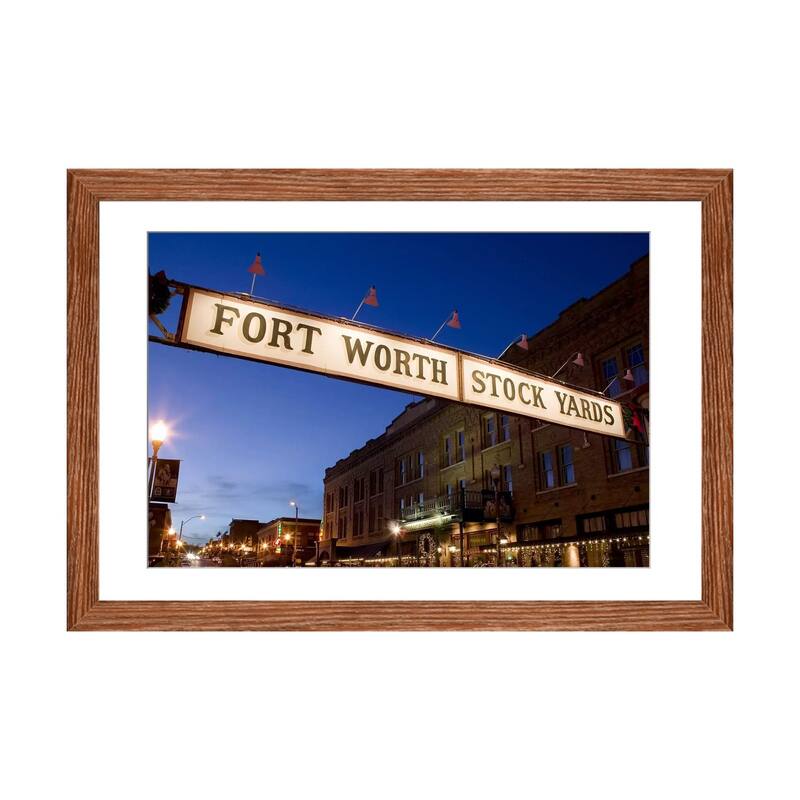 iCanvas "Signboard over a road at dusk, Fort Worth Stockyards, Fort Worth, Texas, USA" by Panoramic Images - Walnut - 16x24x1